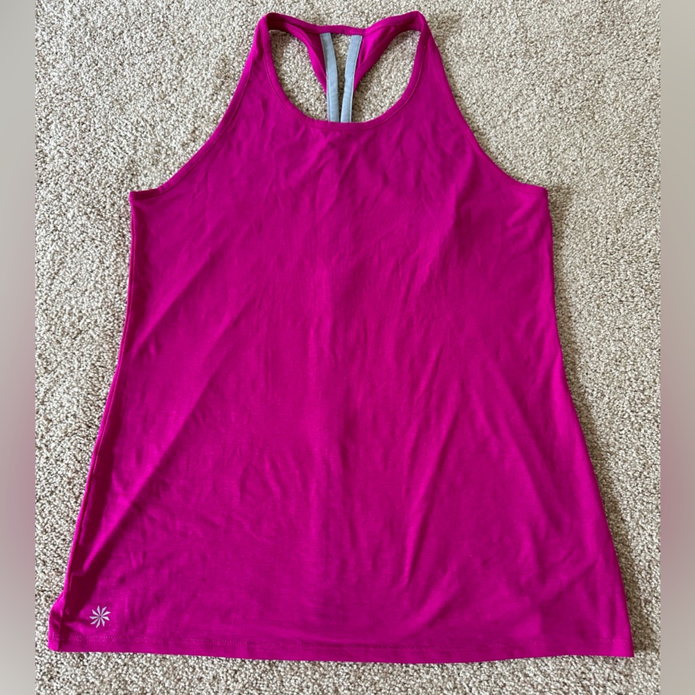 NWOT. Athleta tank top with reflective stripe.